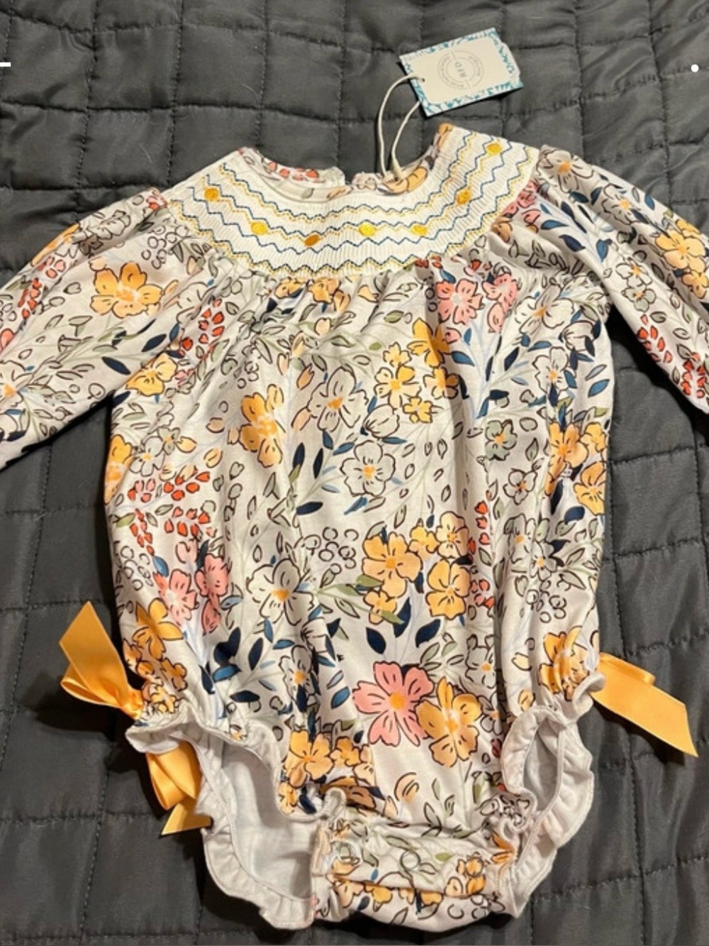 Floral Smocked Long-Sleeve Baby One-Piece in Cream and Yellow
